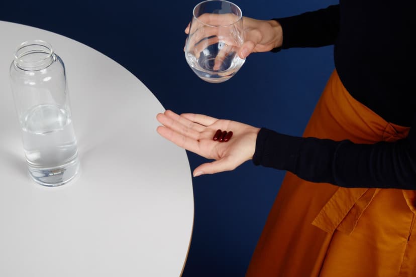 woman taking vitamins