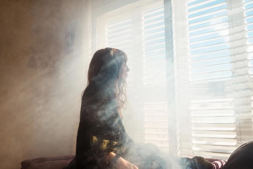 Woman looking out window