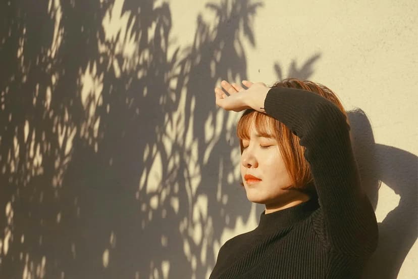 woman with eyes closed