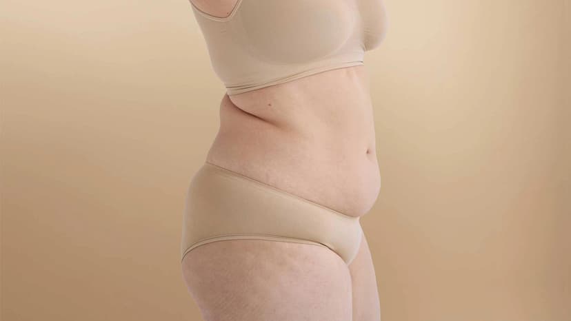 Person with their belly exposed