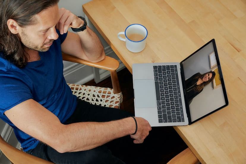 man talking to doctor over video chat